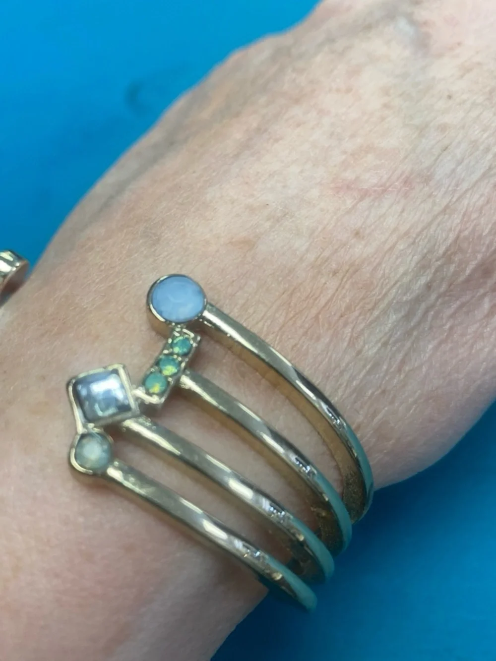 Gold-Tone Open Cuff Bracelet with White, green  Stone Accents